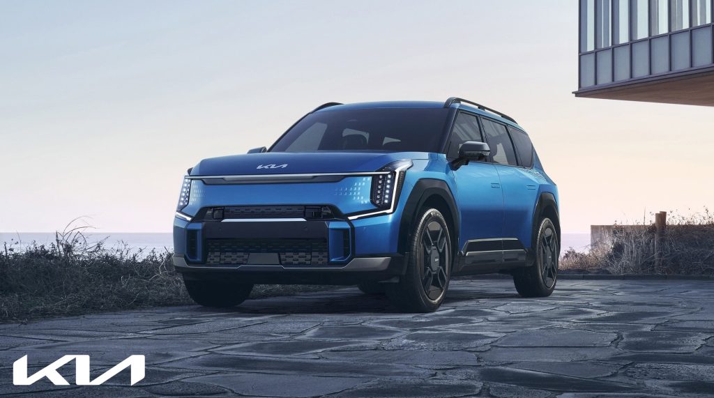 A 2024 Kia Ev9 parked outside a fancy home near Hayward, CA