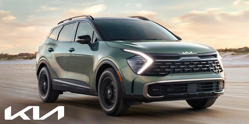 A 2024 Kia Sportage Hybrid driving on the sands near Hayward, CA